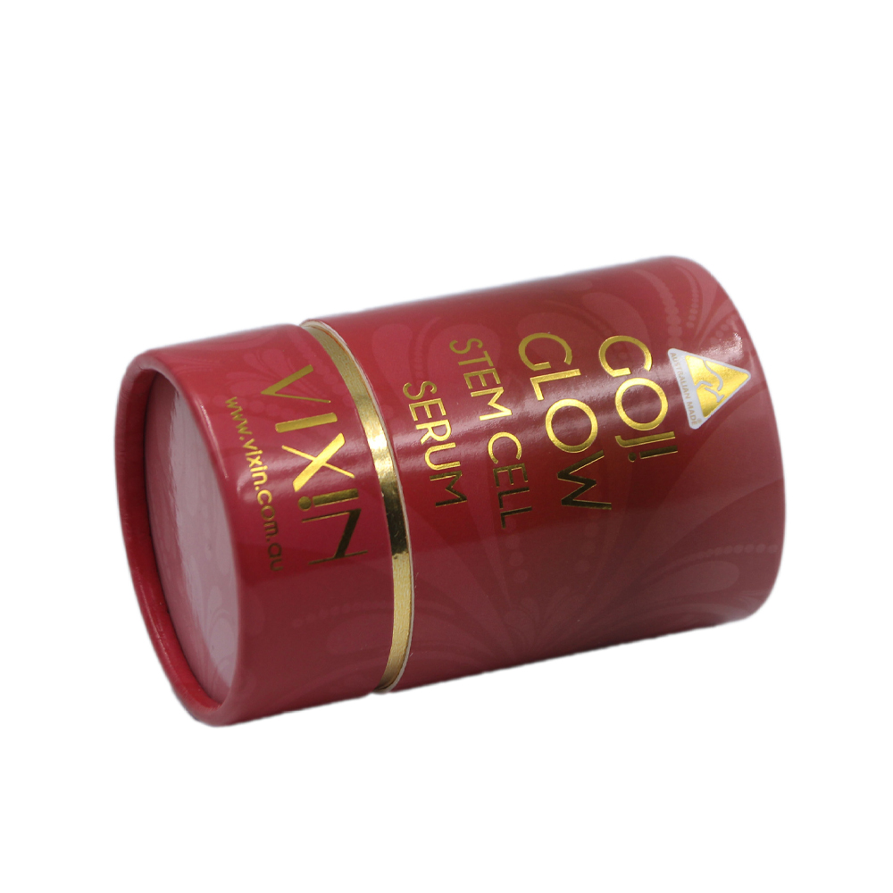L'emballage cylindrique en carton enferme la bouteille de parfum, les coffrets cadeaux ronds pour l'emballage de parfum  