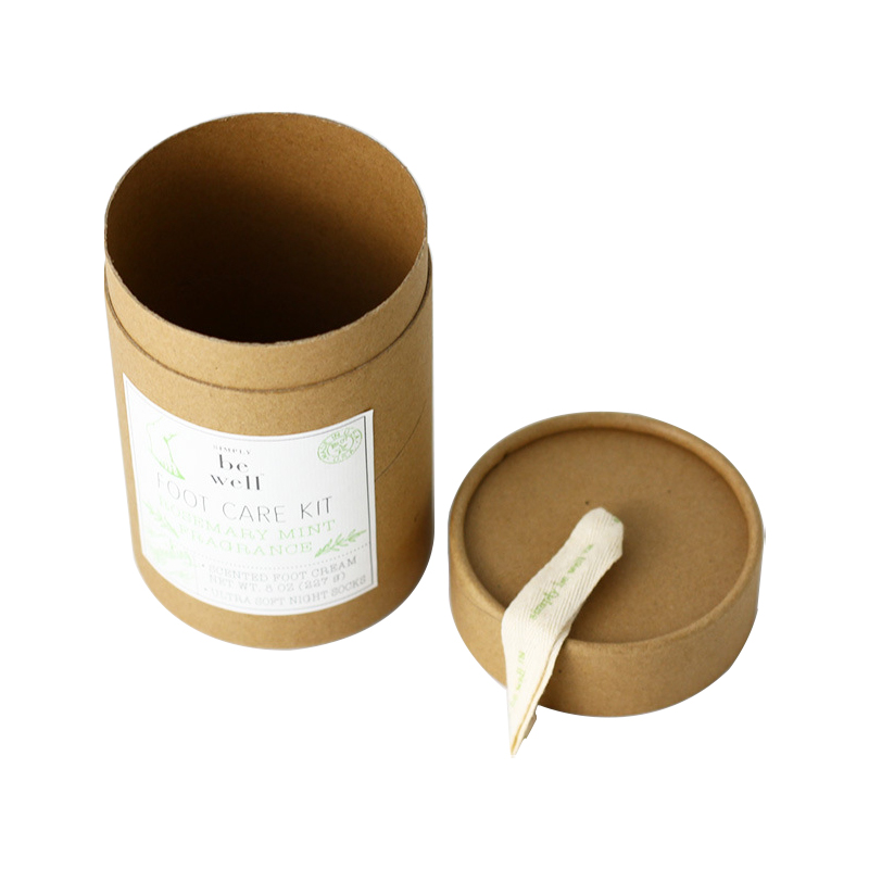 Le tube de papier kraft brun naturel enferme des boîtes rondes pour l'emballage de parfums avec la poignée de corde